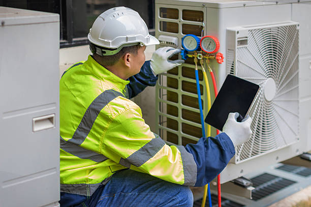 Professional Heat Pump Repair technician working in Amber, OK
